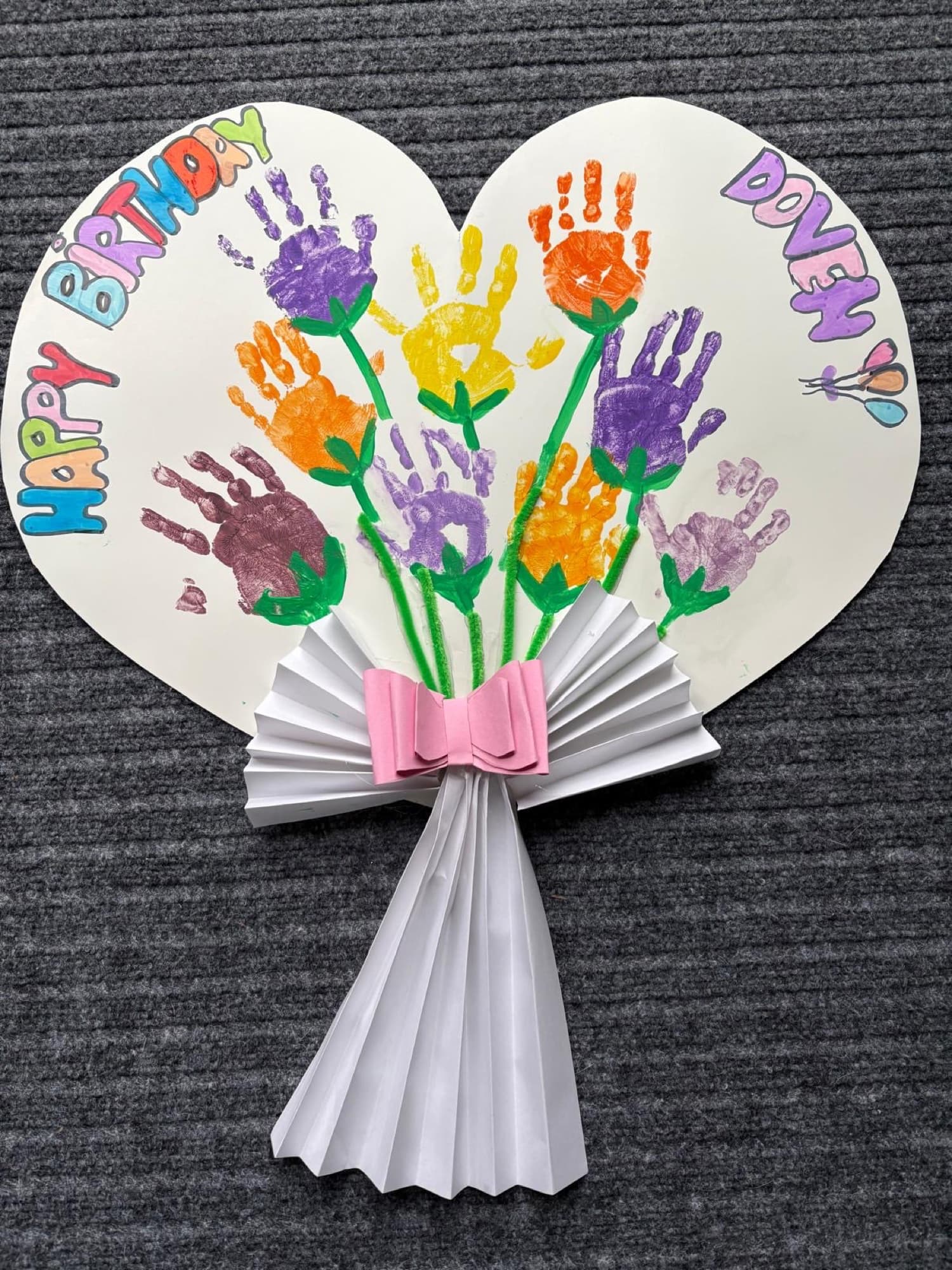 A handprint flower bouquet birthday card