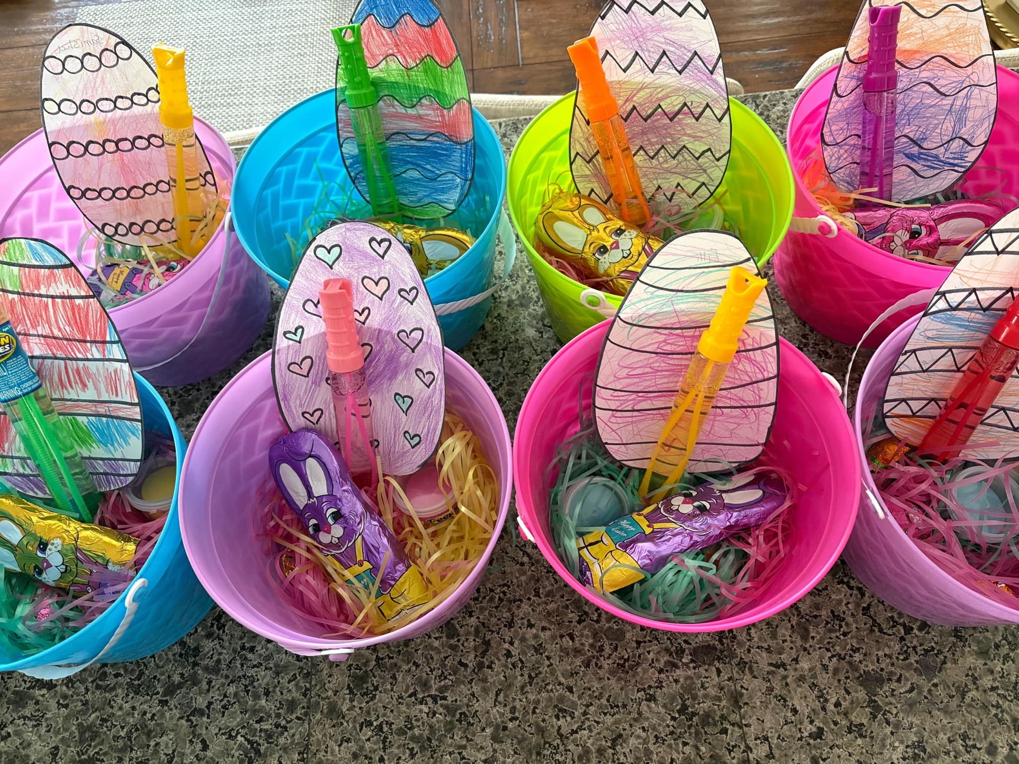 Easter baskets prepared for each child with treats and colored paper eggs